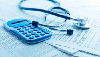 A calculator and stethoscope. Learn more about free detox centers, and how to get insurance coverage for a free detox