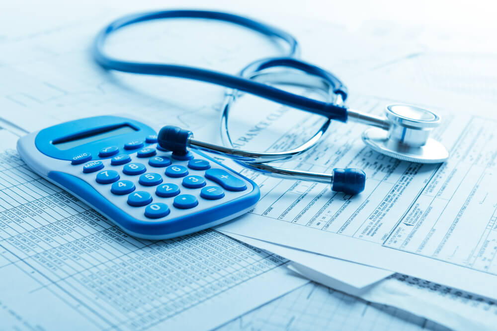 A calculator and stethoscope. Learn more about free detox centers, and how to get insurance coverage for a free detox