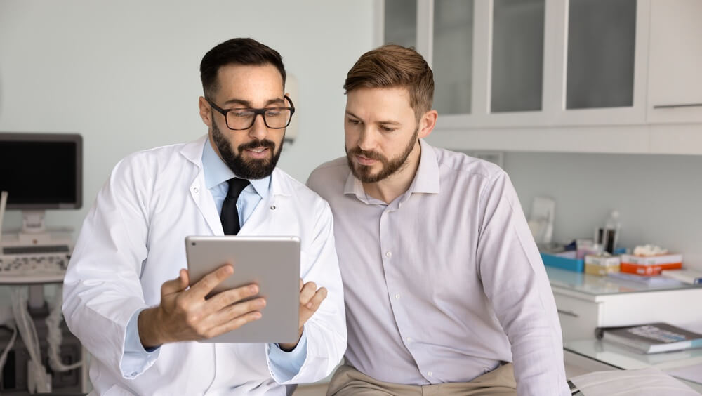 A doctor speaking with a patient