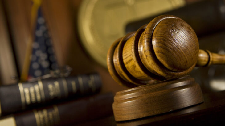 A gavel at a judge's desk in court