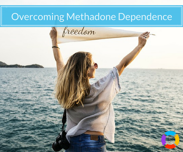 recovering methadone addict holding a flag that says "freedom"