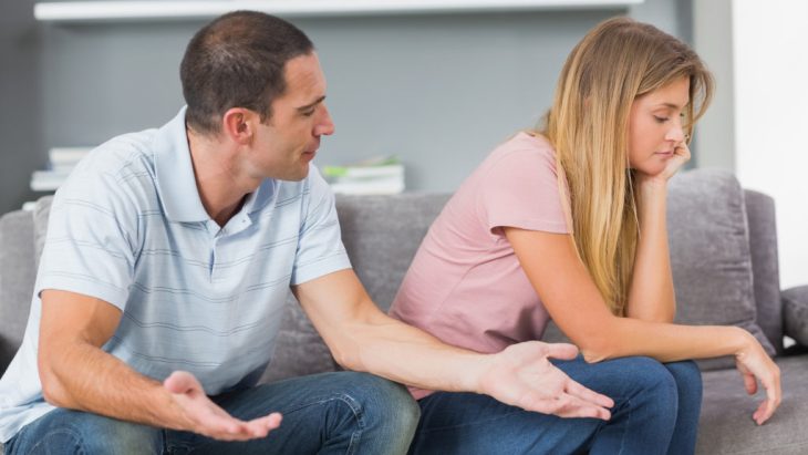 Two people having an argument inside their home