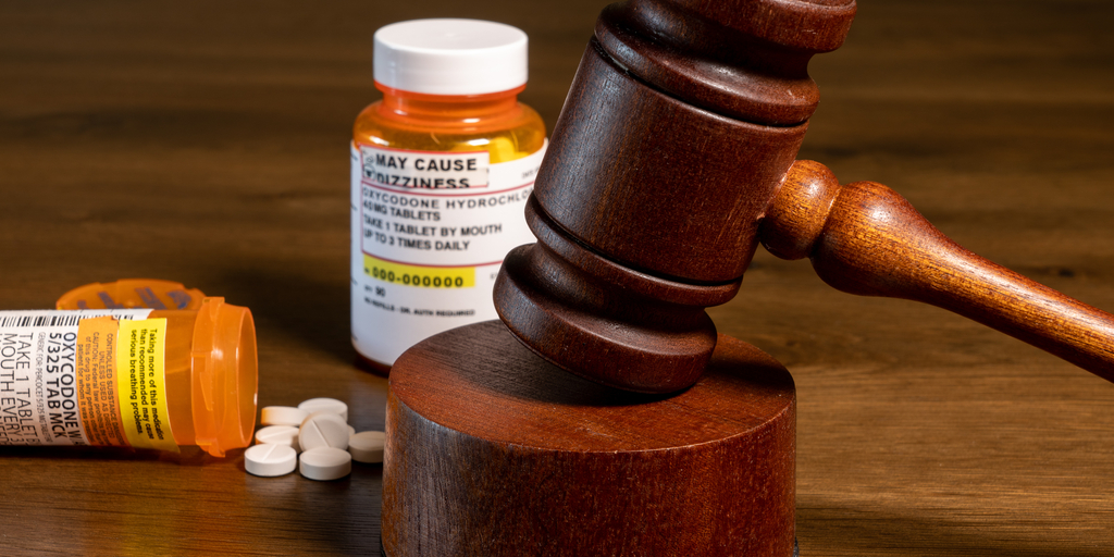gavel and pill bottles