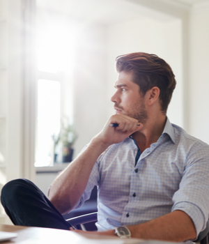 young man at his desk