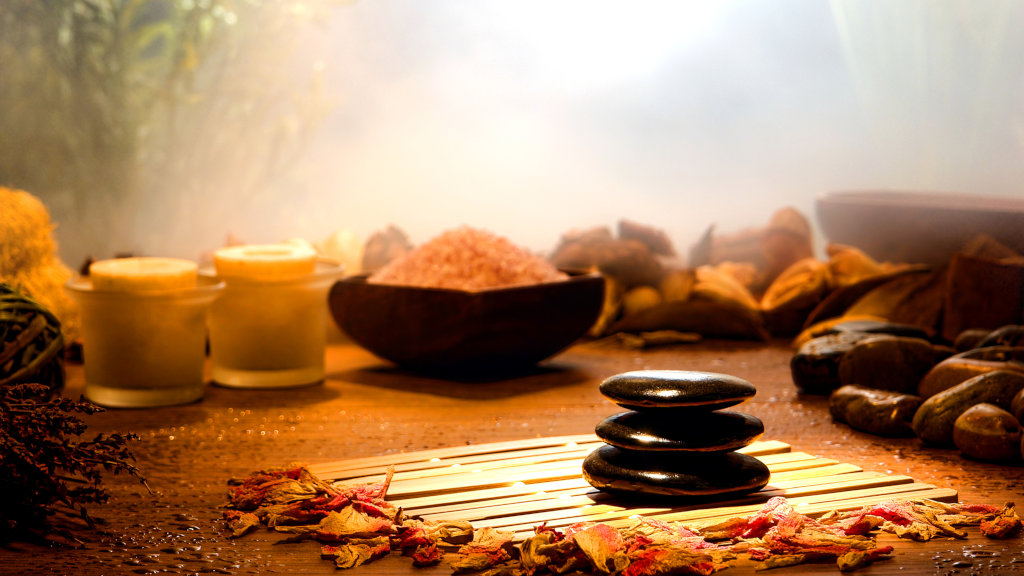 Hot stones, herbs, and candles- all parts of meditation and relaxation, which are often used in alternative detox for drugs and alcohol
