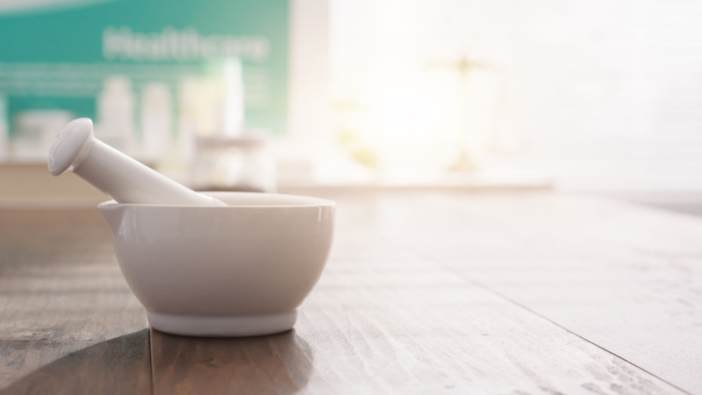 A mortar and pestle in a pharmacy
