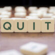 Tiles spelling out the word "quit". Learn if quitting cold turkey is recommended here.