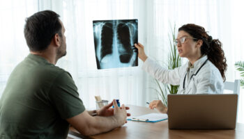 a doctor explains something to a patient. Learn more about polysubstance use disorder, including the deadliest drug combos here.