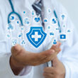 A doctor holding a symbol of a shield with a medical cross in it. Does Aetna cover drug and alcohol detox or rehab? Learn more here.