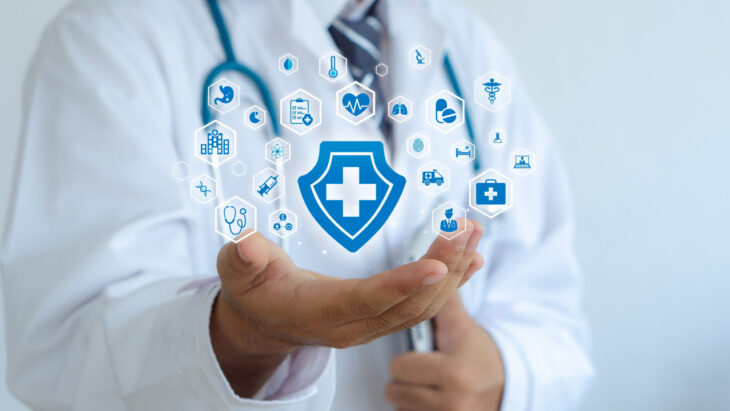 A doctor holding a symbol of a shield with a medical cross in it. Does Aetna cover drug and alcohol detox or rehab? Learn more here.