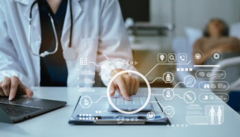 A doctor taps away at a smart tablet. Does UnitedHealthcare offer rehab or detox coverage? Learn more here.