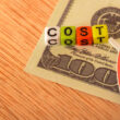 A 100 dollar bill with the word "cost" above it. Learn more about what detox and rehab may cost with medicare, here.
